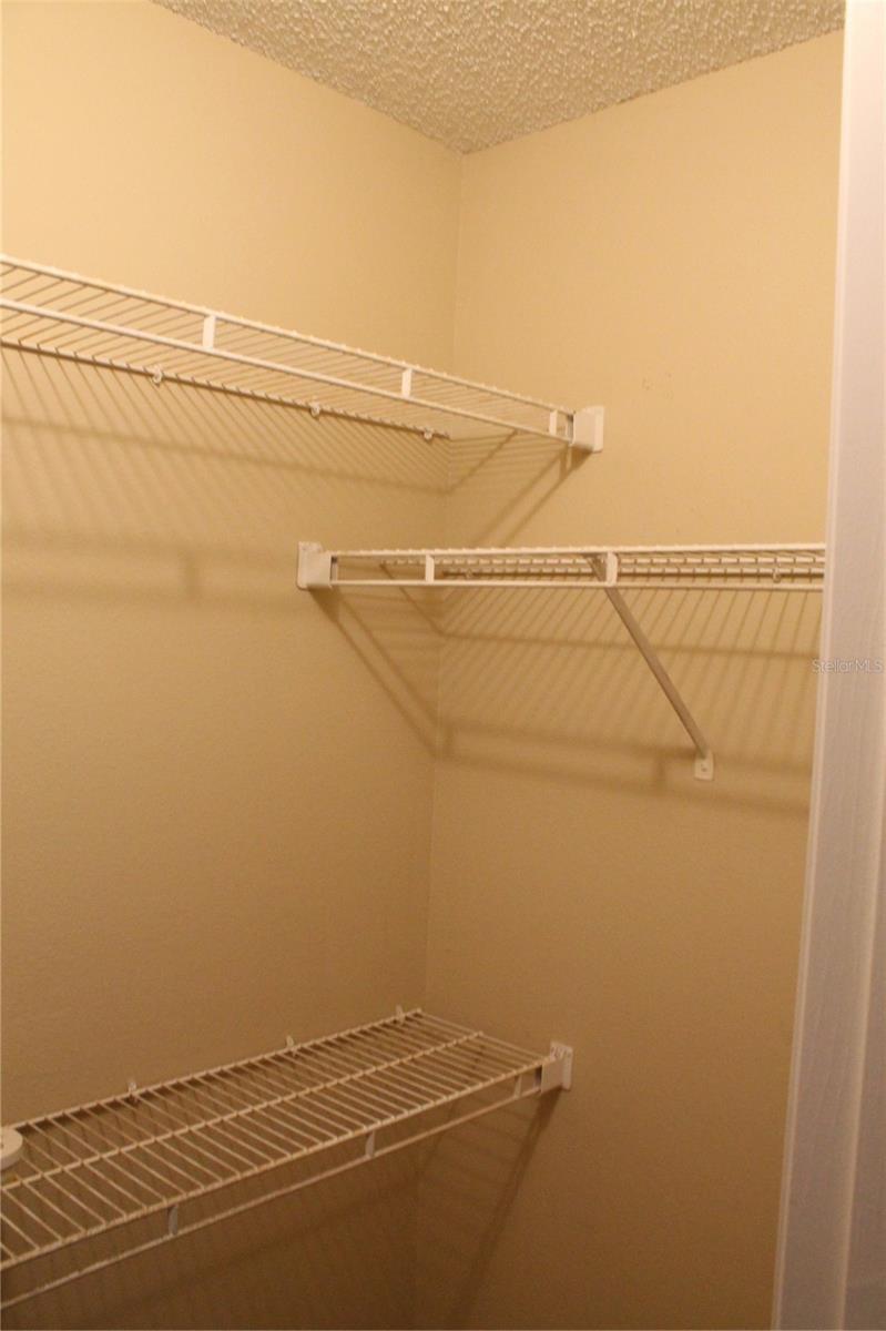 walk in closet in master bedroom