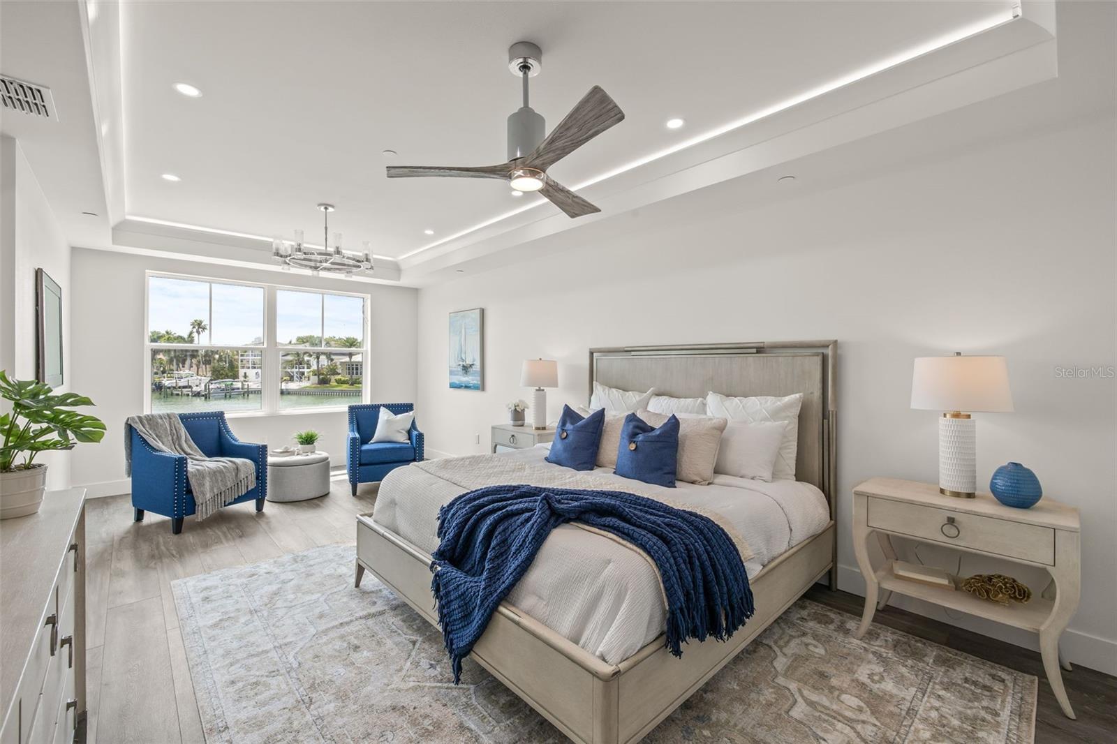 Waterviews right when you walk into the primary bedroom. It has LED lighting and recessed lighting.