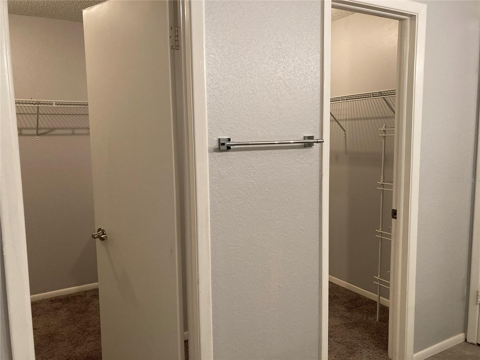 Primary Bedroom Walk-in-Closet/room- entrances from Bath