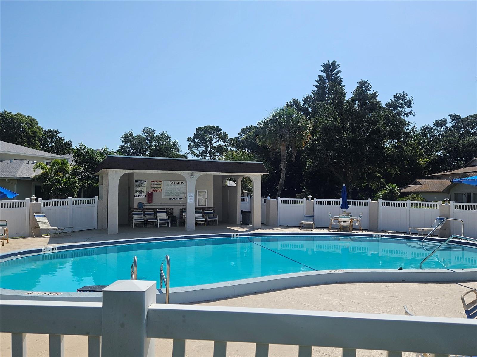 Pool area with Bathrooms.