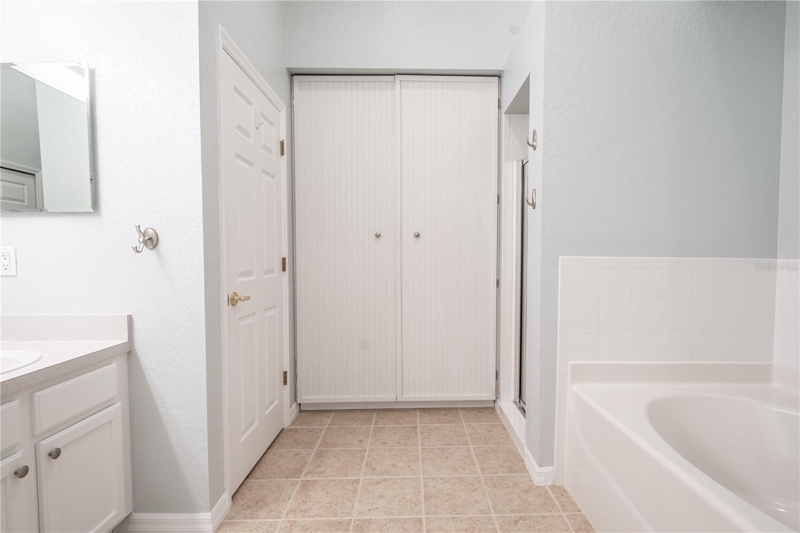 Primary ensuite features a rub with separate shower.