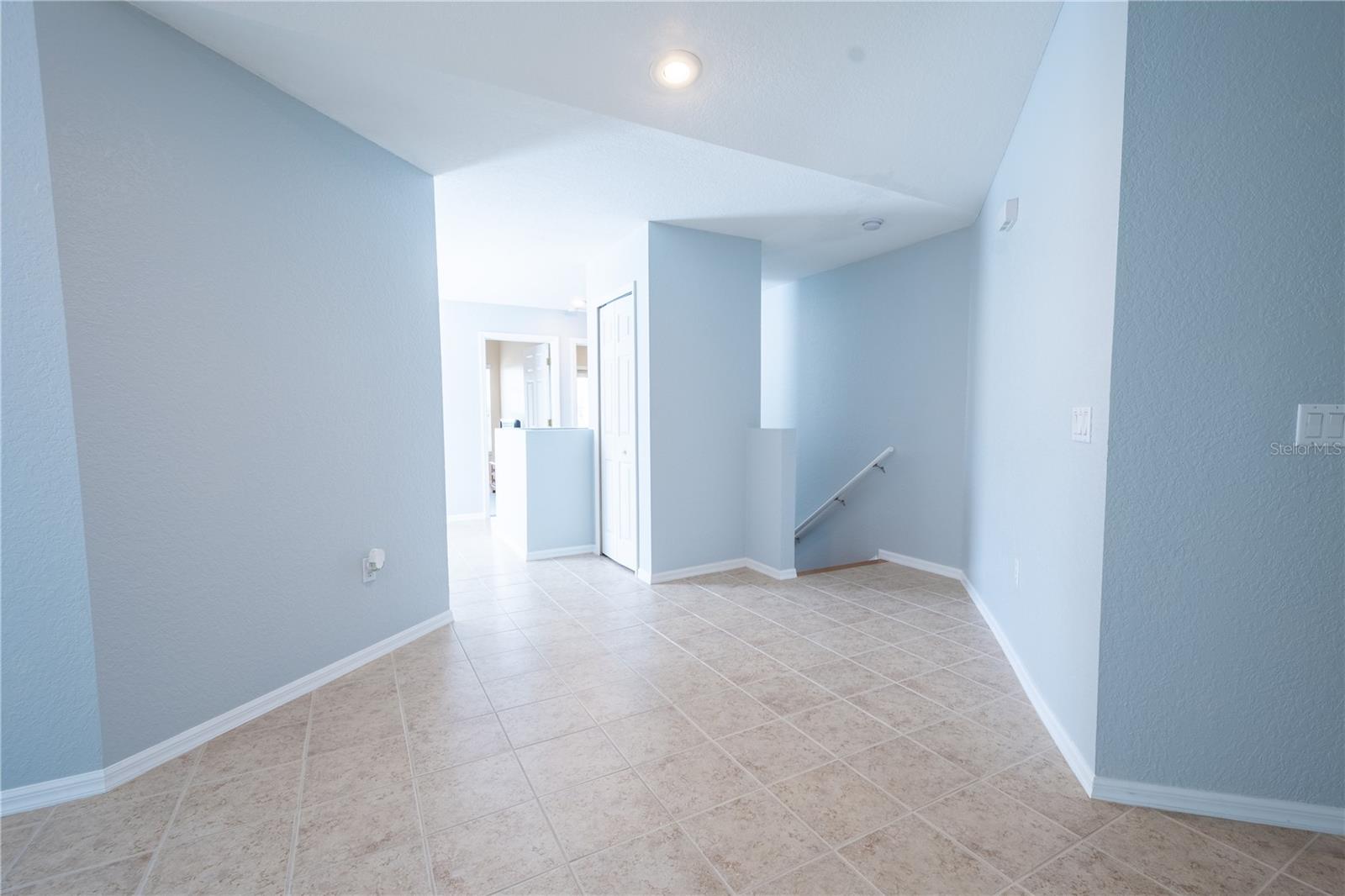 A spacious foyer upon entry.