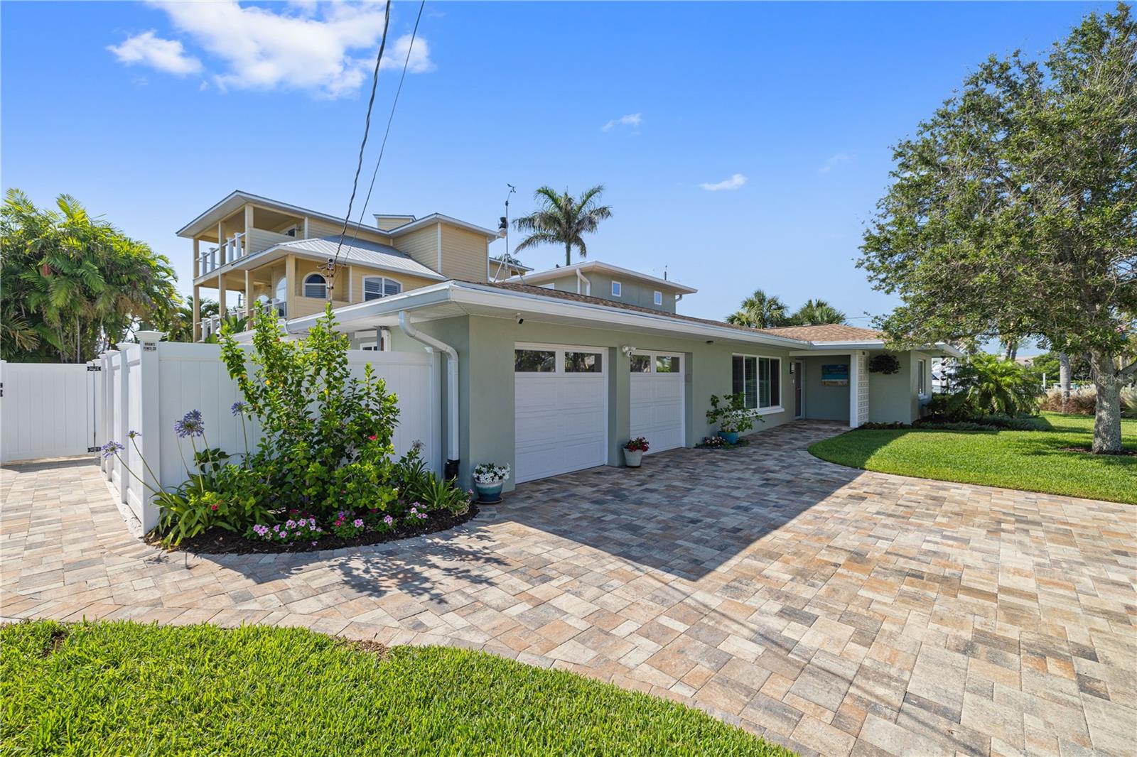 Newer drive and sidewalks with gorgeous pavers.