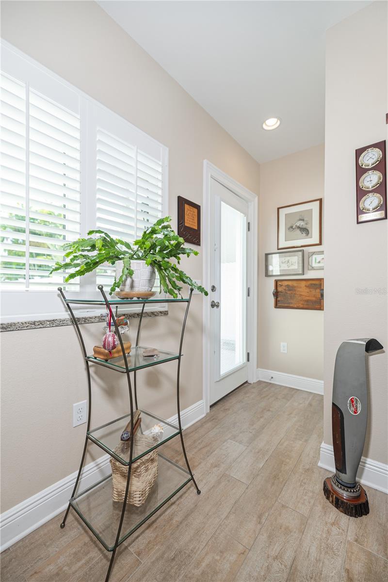 At the rear of living area is a door to the pool area. Under the stairs is a generous storage closet.