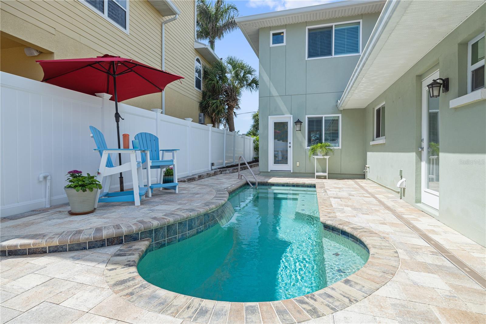 Gas-heated, saltwater pool...with cascading waterfall. Heated spa, with jet settings and a tranquil sundeck above the waterfall.