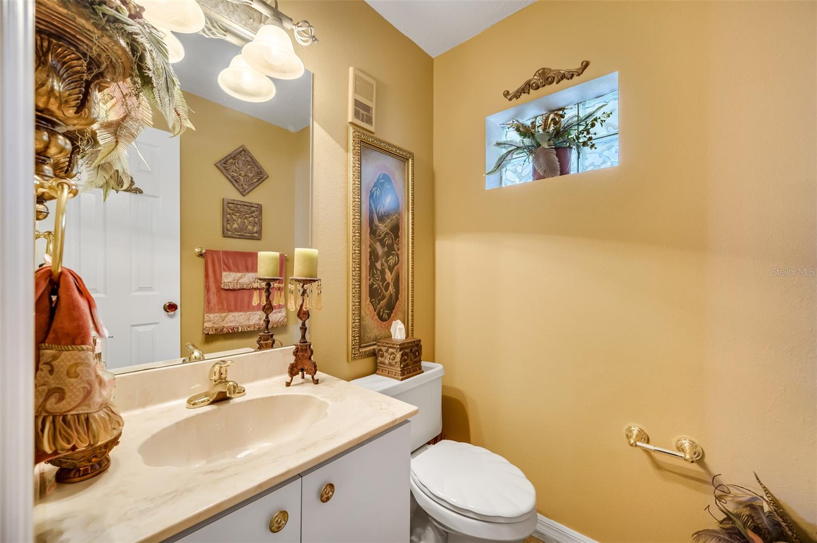 Powder room by kitchen