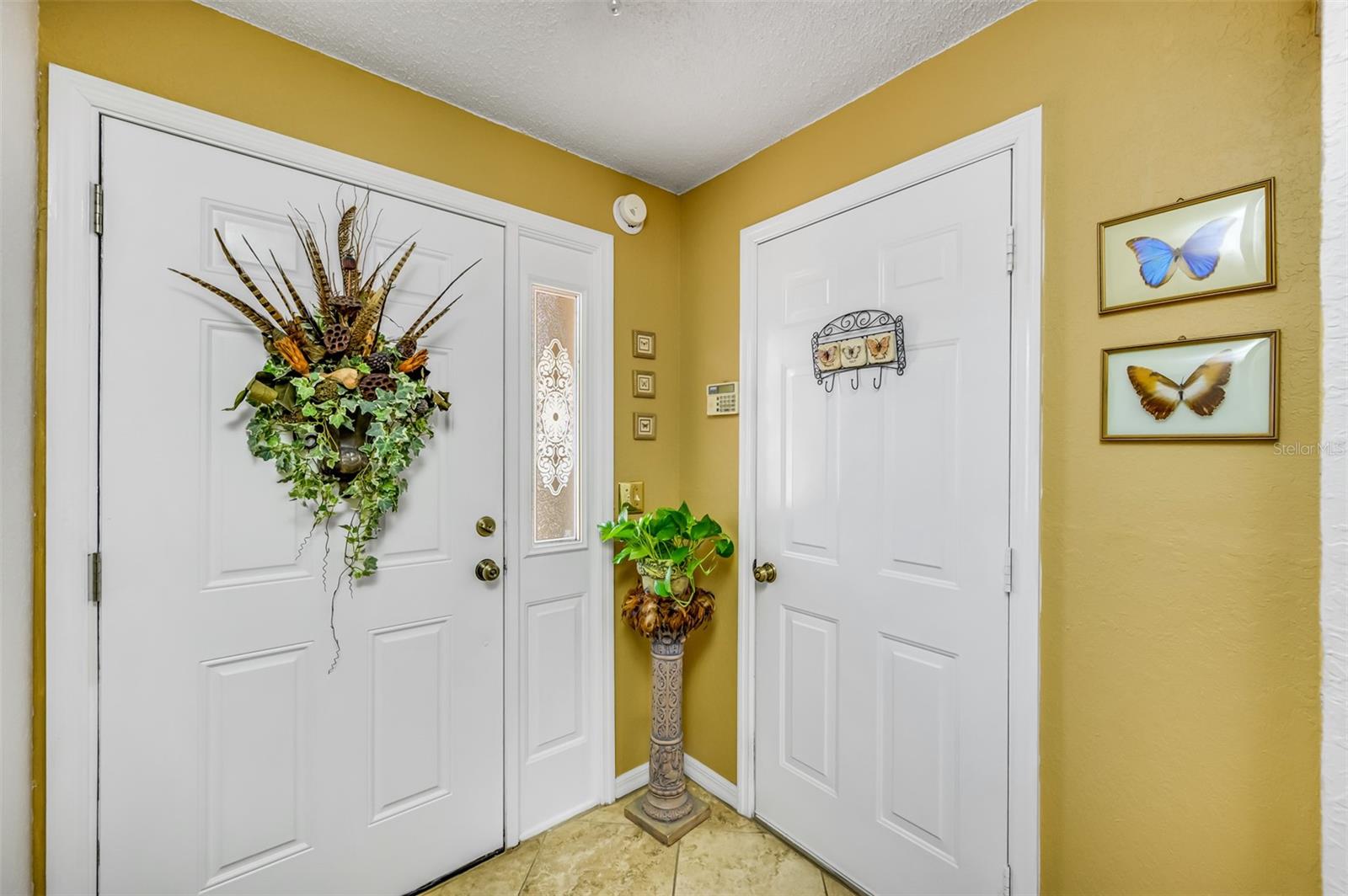 Main floor- Garage access, screened in patio