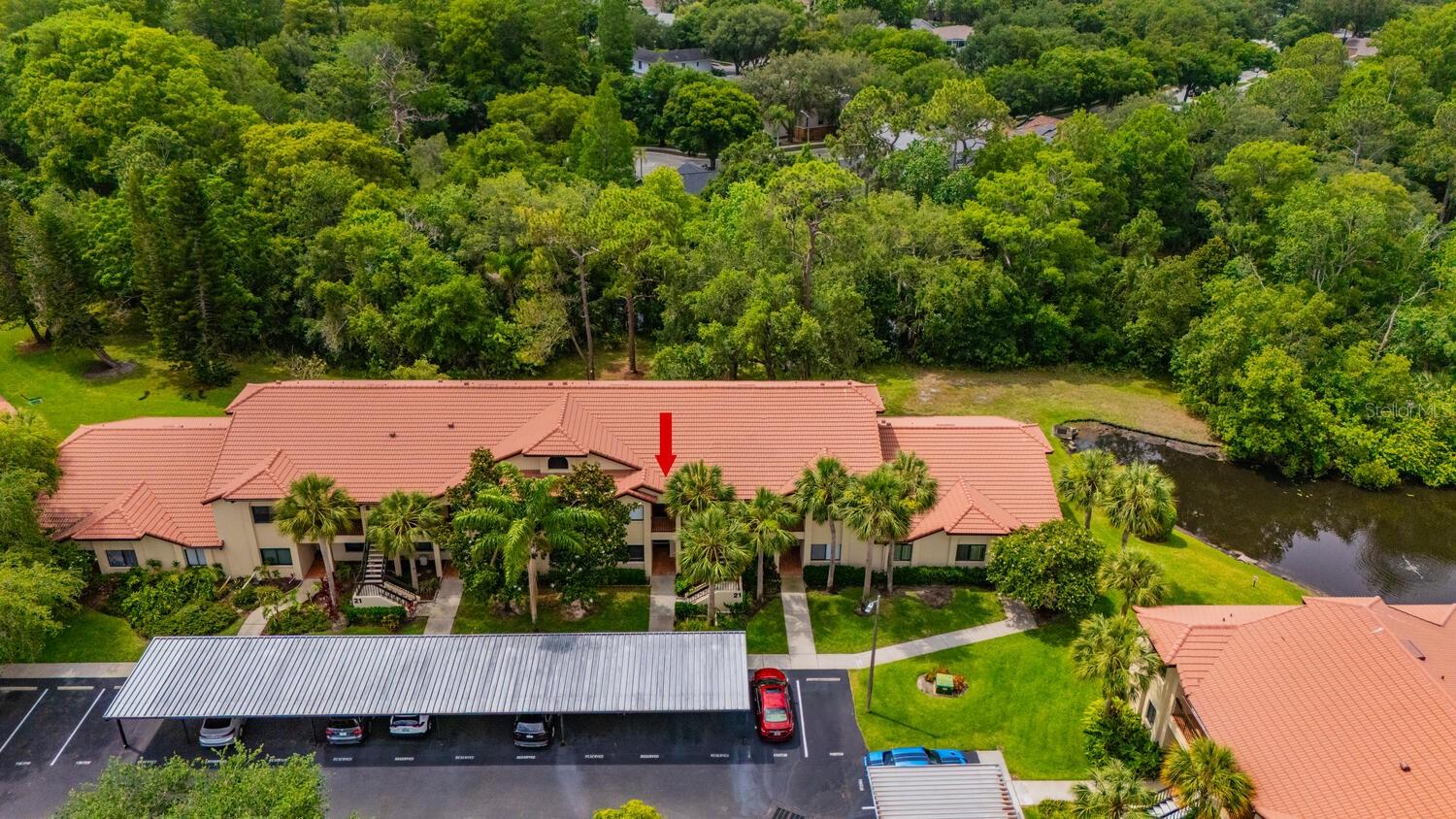 Aerial view showing location of condo and carport