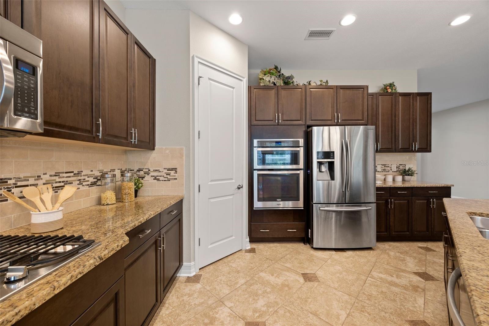 Fully equipped kitchen with stainless steel appliances