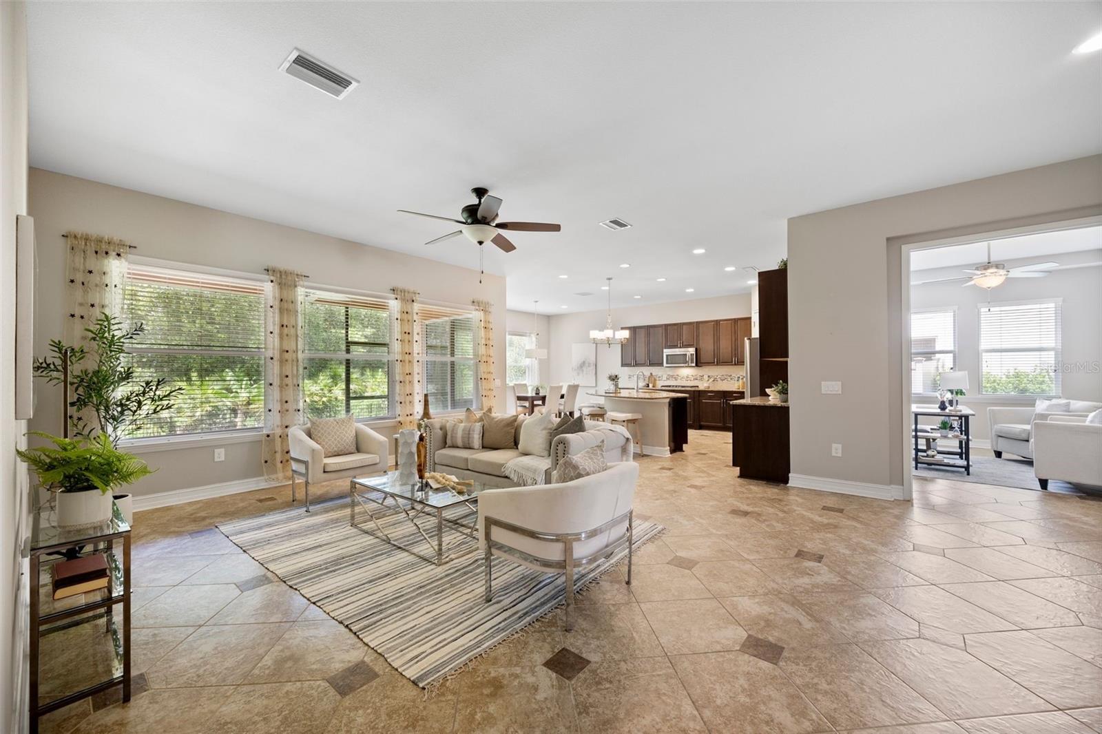 Family Room with view of Kitchen and enclosed office