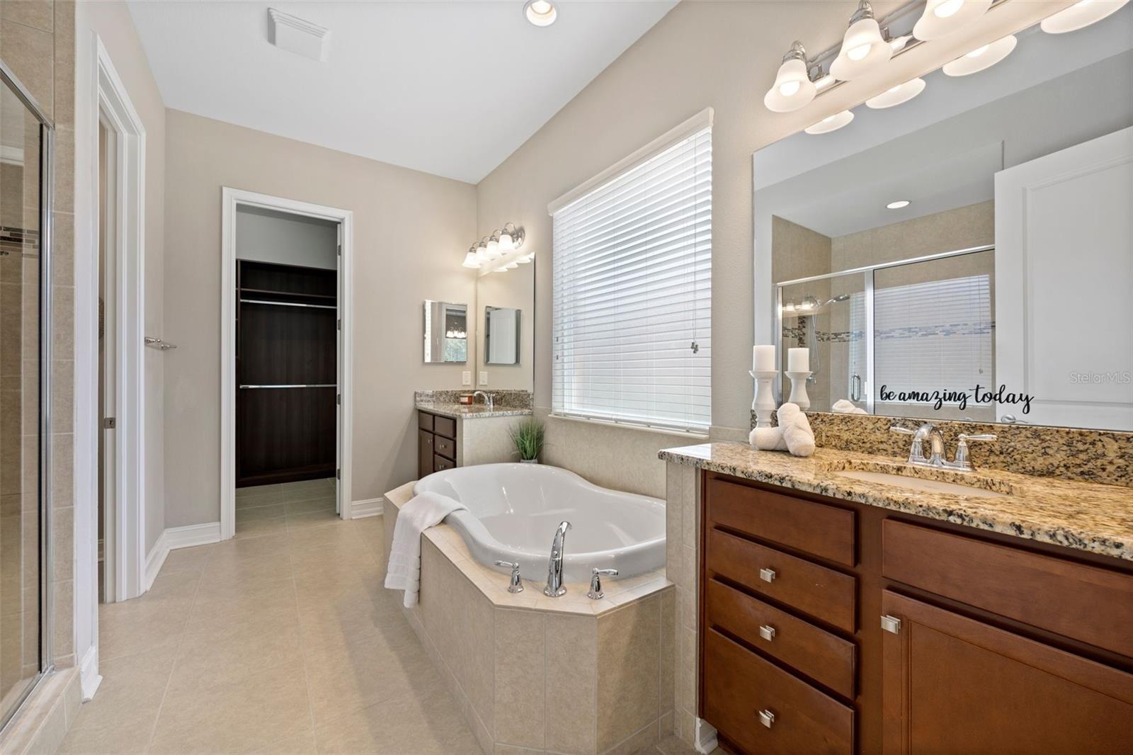 Double sink bathroom with soaking tub