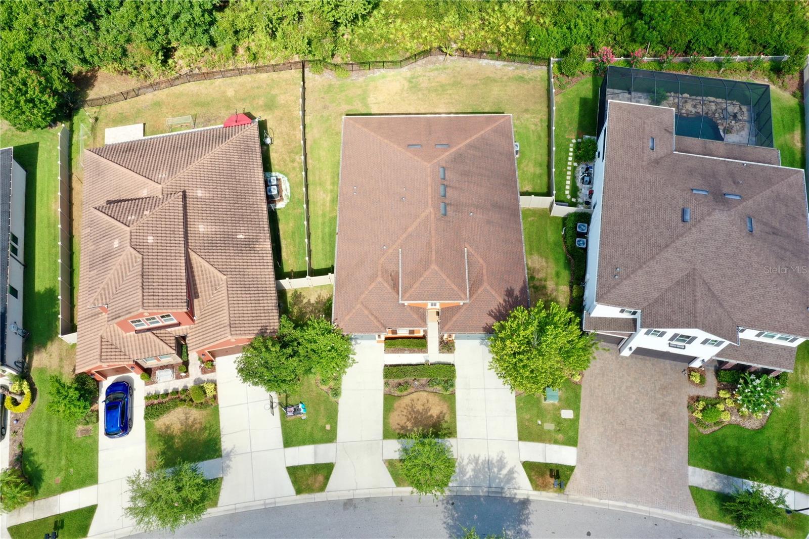 View of the home with both driveways