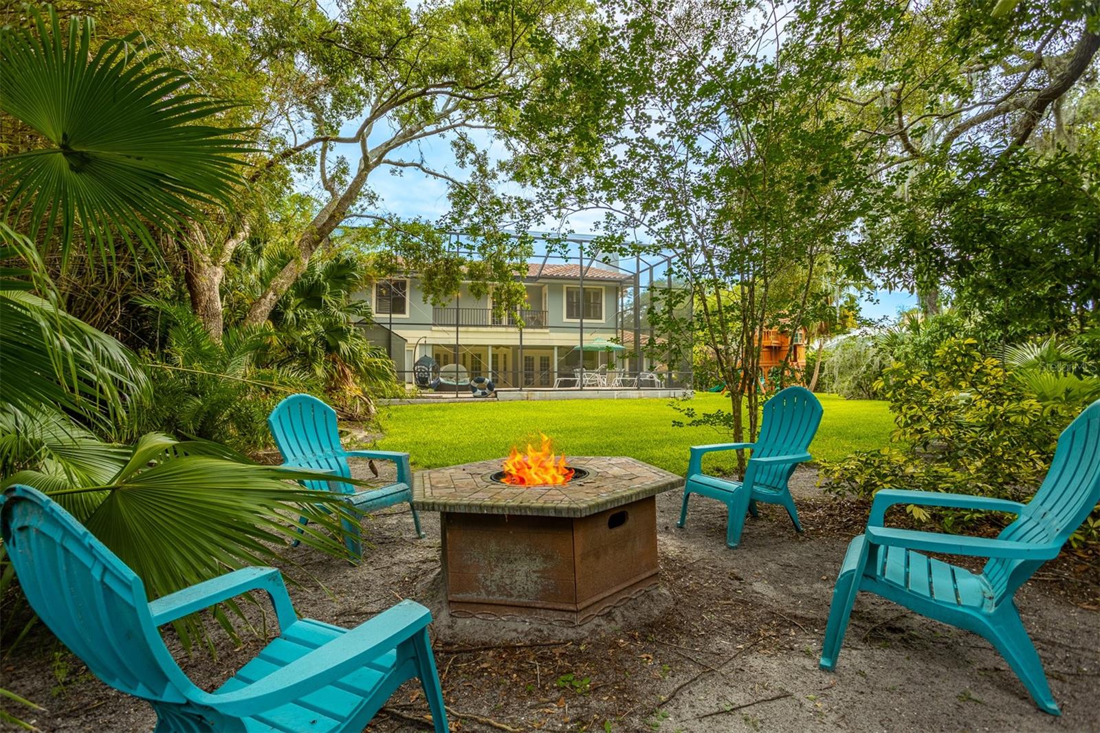 Fire pit from the back yard looking toward the home