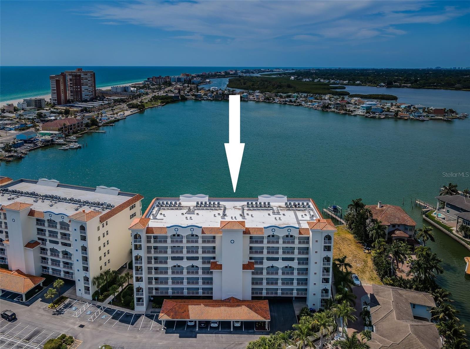 ... . Arrow Over La Bahia Building. Looking WNW.  Spectacular Long Range Views of the Boca Ciega Bay and the Gulf of Mexico in the Background. This large Body of Water attracts plenty of Marine Life. Dolphins bring their Young Calves here to practice Fishing Skills and to Swim on their own. Calves can stay with their Mothers for up to 3 to 5 Years.