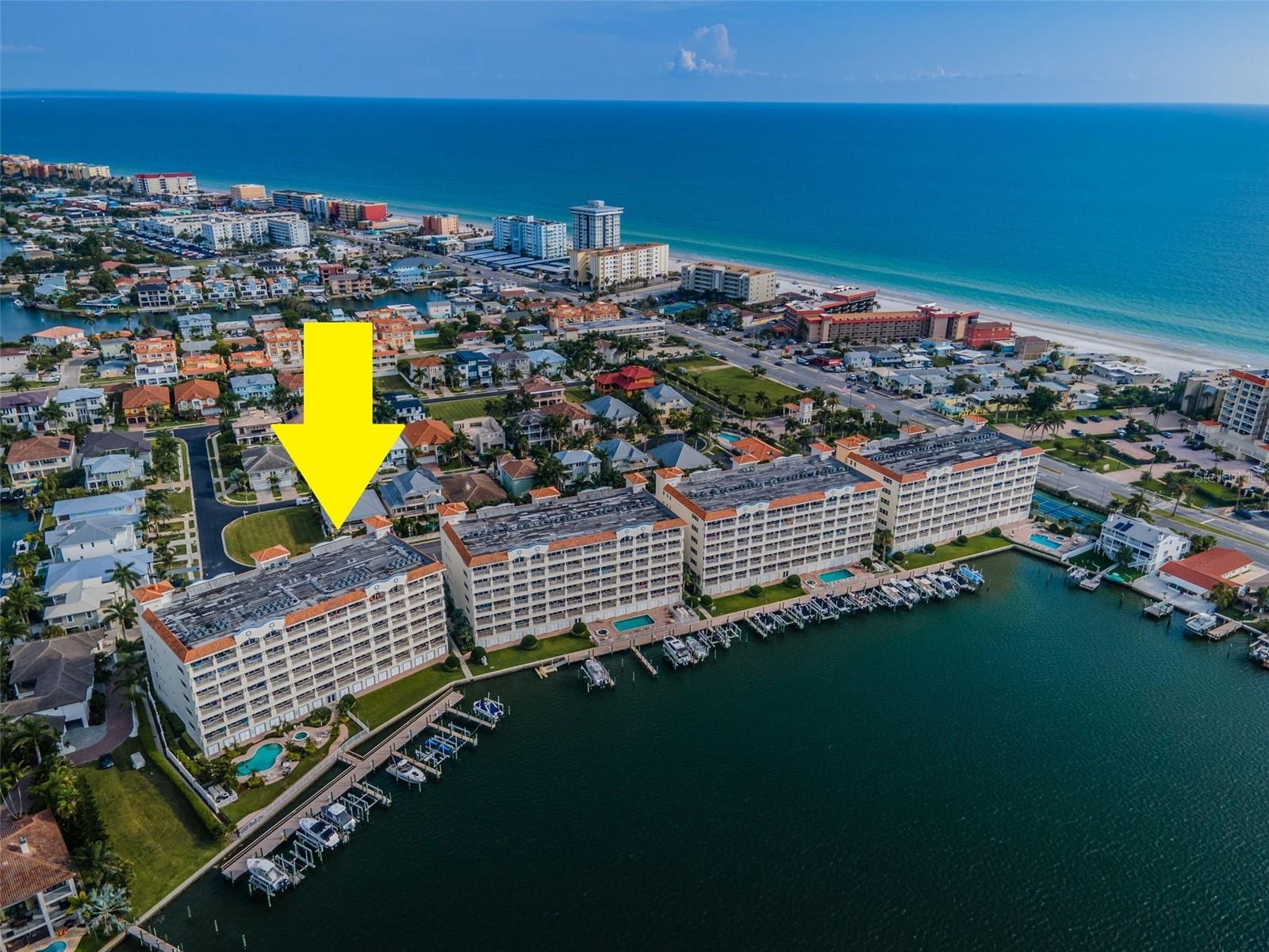 .. Redington Shores Yacht & Tennis Club Looking South Down the Gulf of Mexico.. We Enjoy about 25 Miles of Sand from Clearwater Beach to St Pete Beach.. Redington Shores sits about halfway between the Two. Guard Gated Community with a 30 Day Minimum Rental Period. Arrow over the La Bahia Building. Boat Slips Front all 4 Buildings.