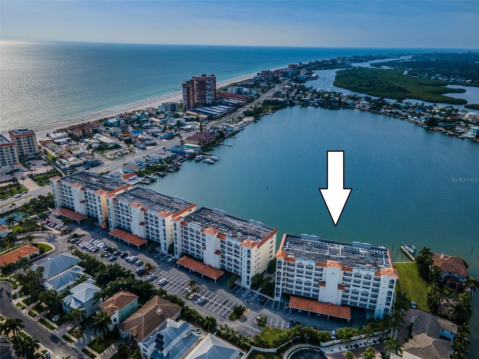 . Redington Shores Yacht & Tennis Club Looks over Boca Ciego Bay / Intracoastal Waterway with the Westerly Sunsets of the Gulf  in the Background.