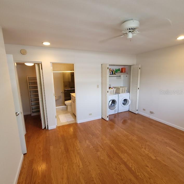 Closet, bathroom, and laundry area.