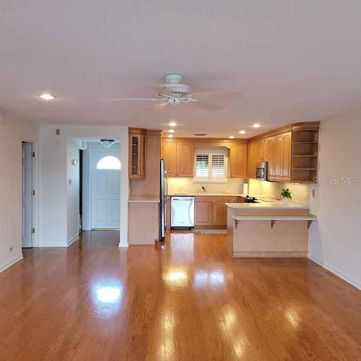 View of the entryway and kitchen from the living room!