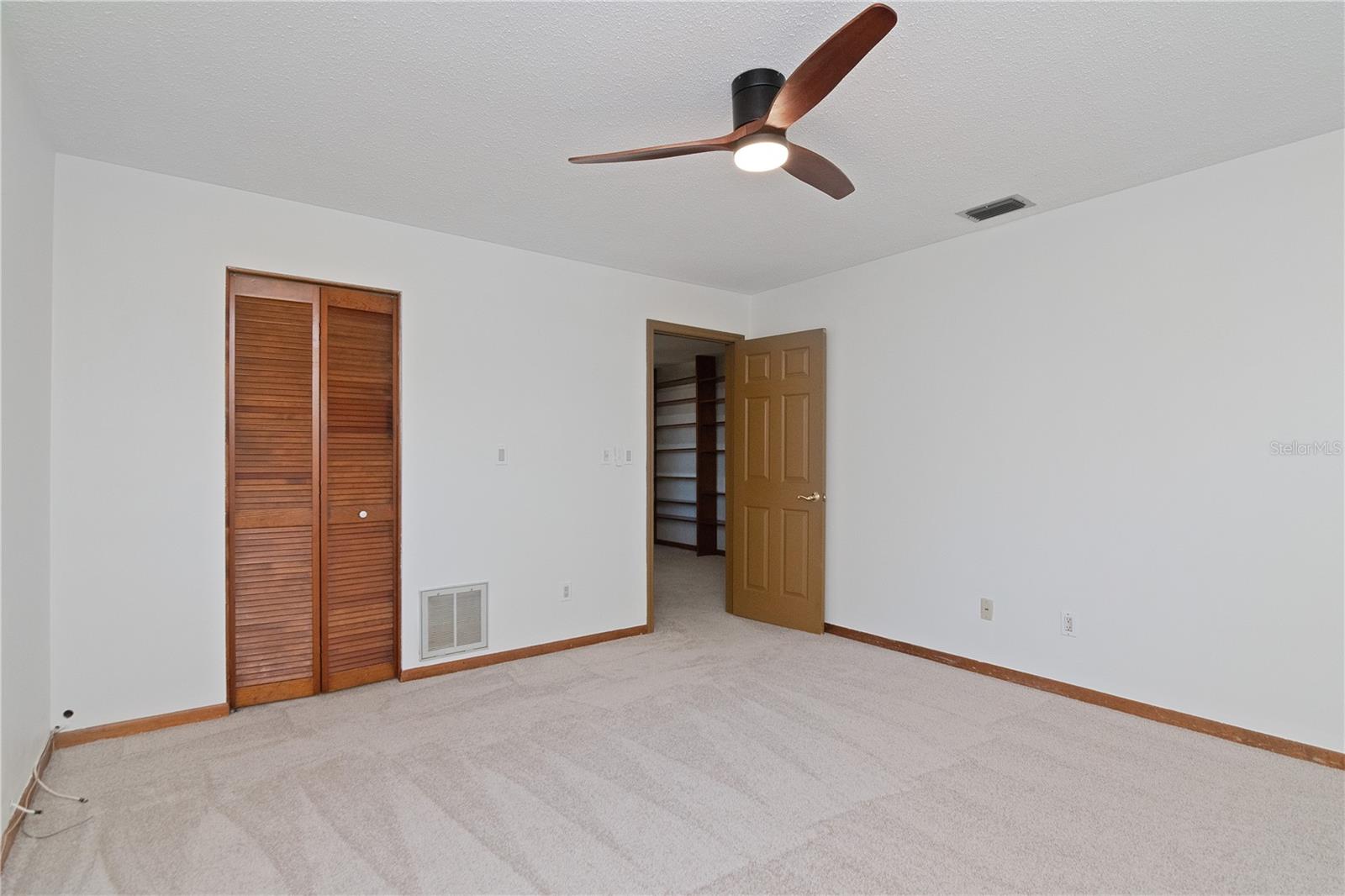 Upstairs Bedrooms feature New Lighted Ceiling Fans, New Paint and New Carpet.