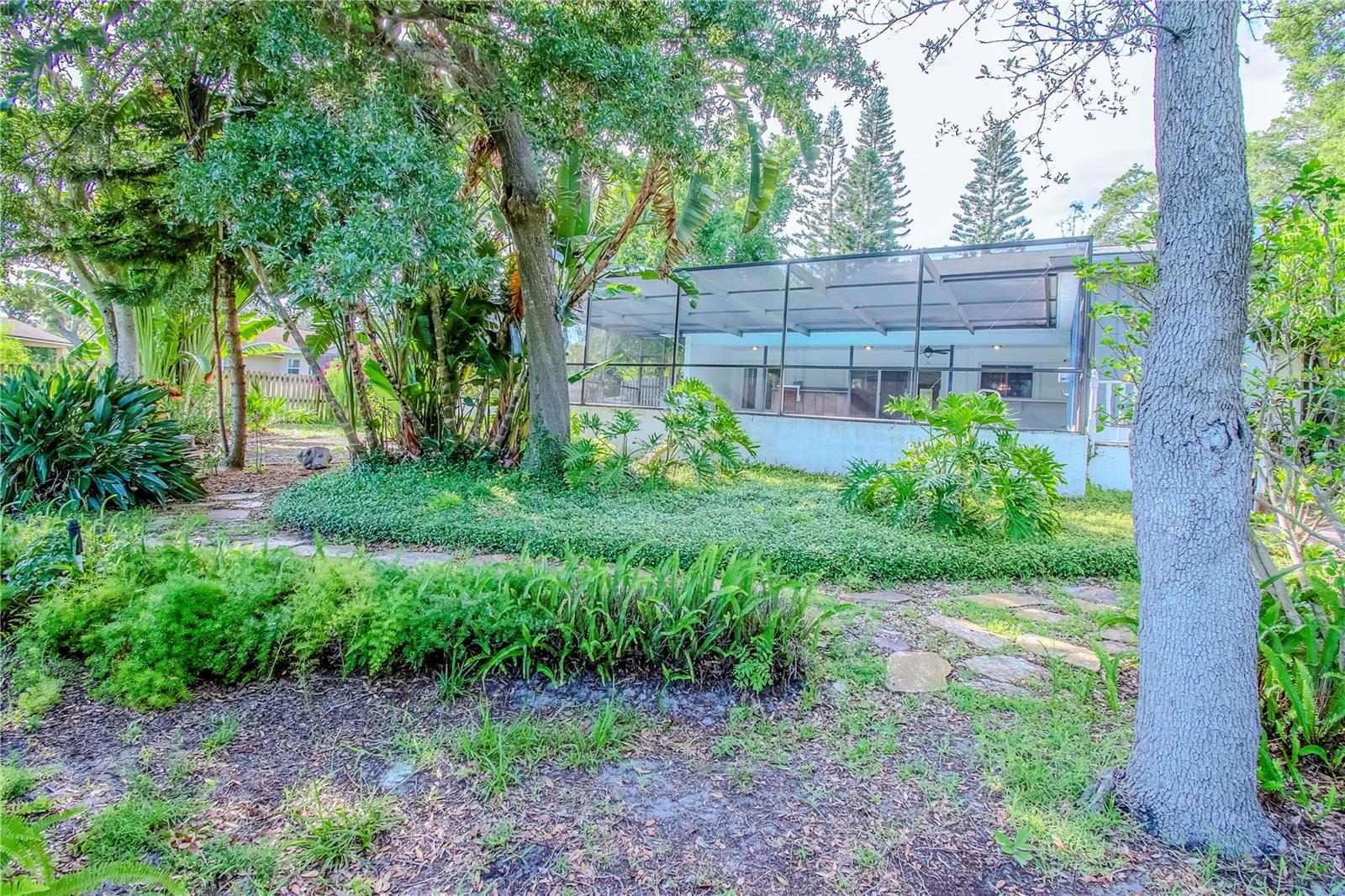 View of Elevated Screened Lanai from Backyard