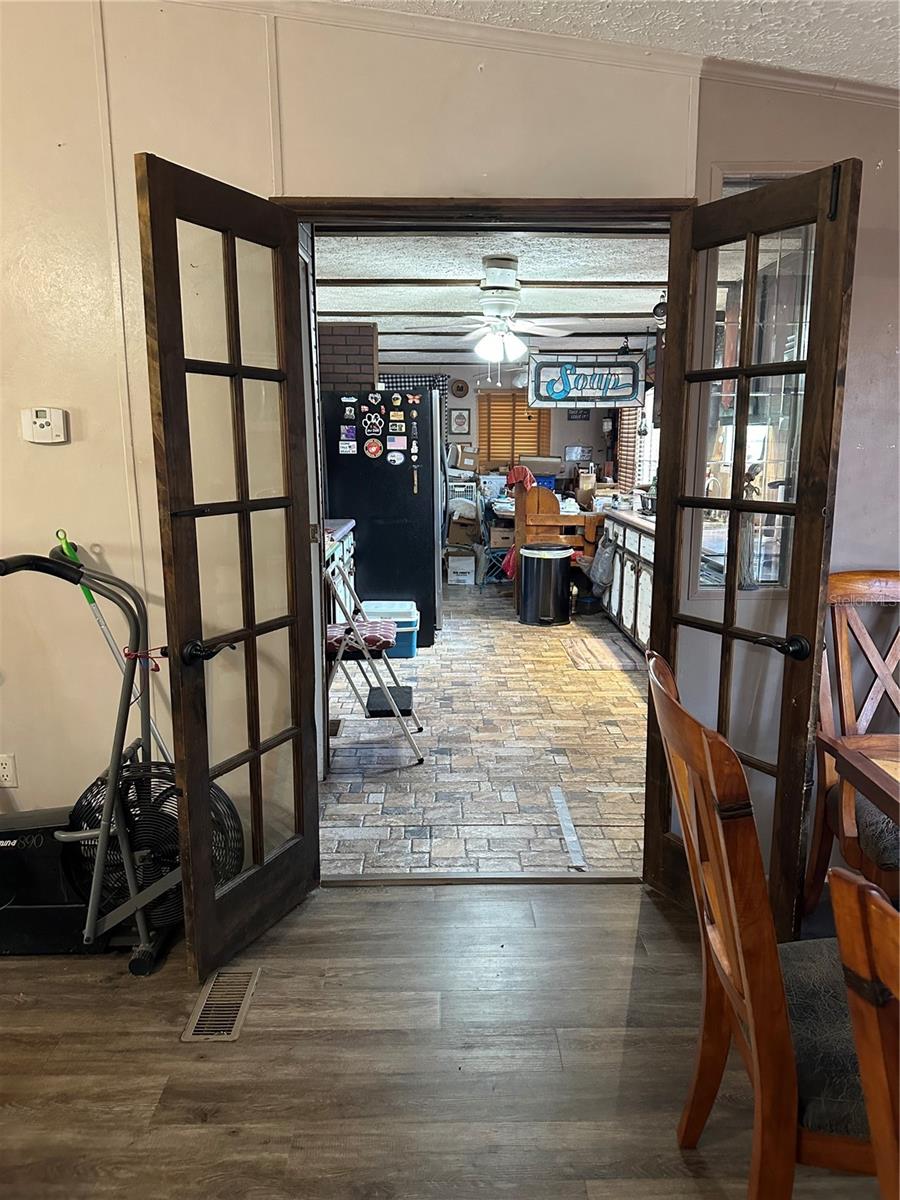 French doors from the Dining Room looking into the kitchen