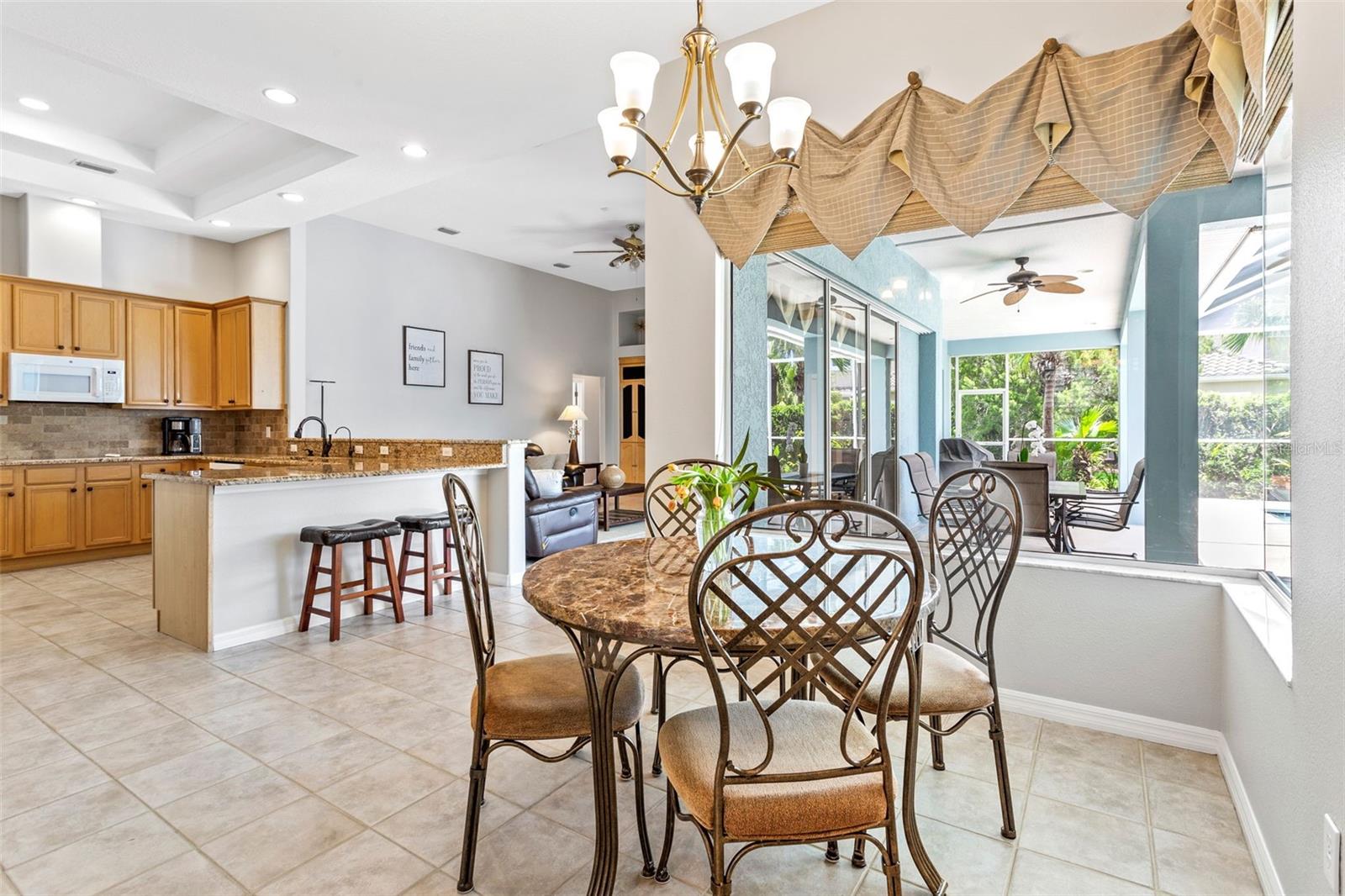 Eat-in space with view to kitchen and family room