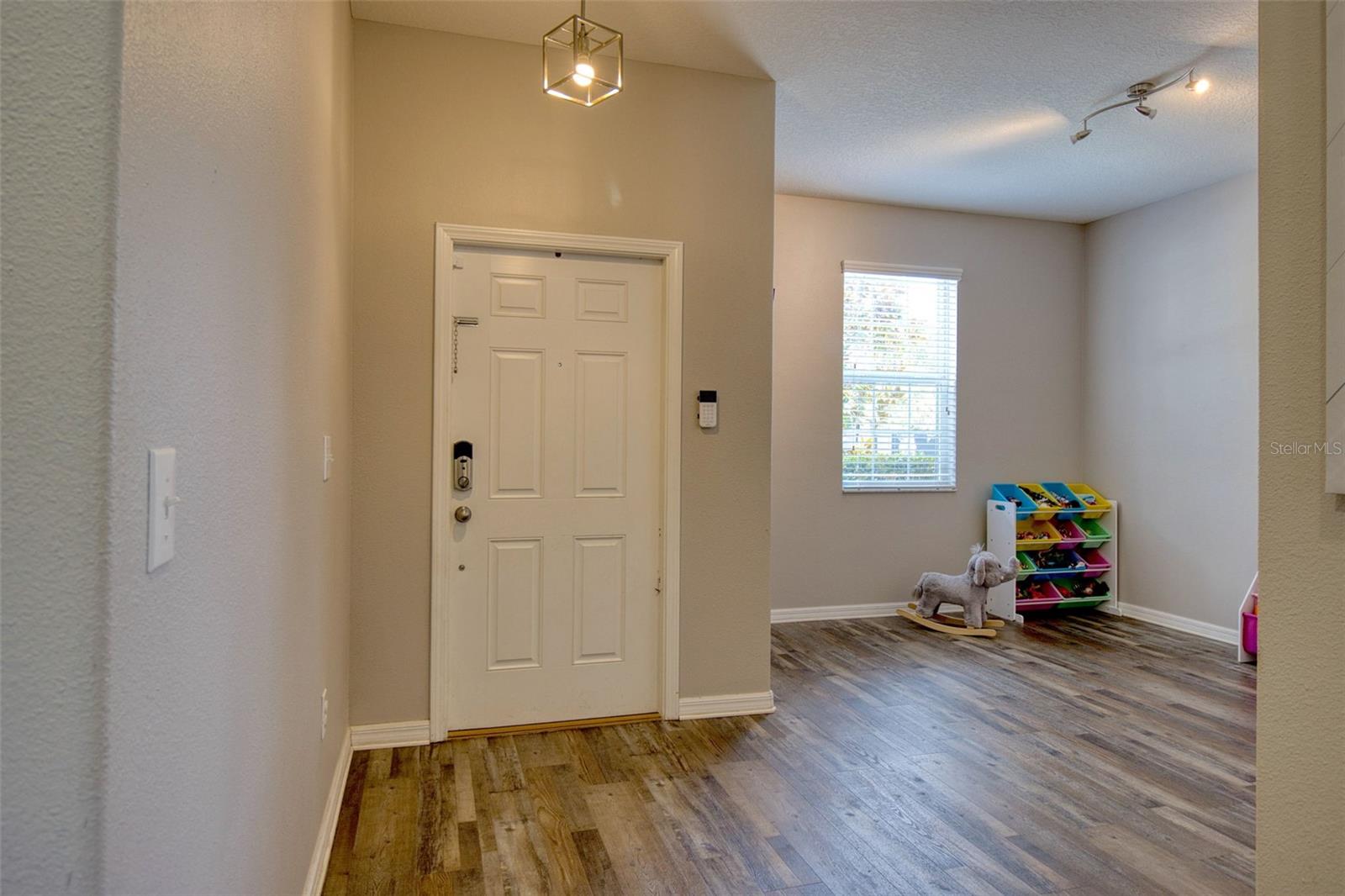 As you enter the foyer you will find the bonus room. Originally planned as the formal dining room. This flex room is a great place for a Home Office, Reading Room, Toy Area or even a 6th bedroom.