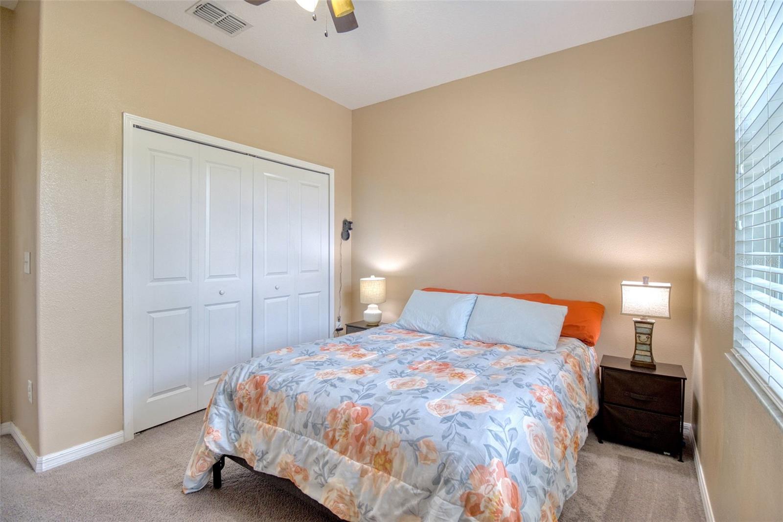 Bedroom 2  is a private and cozy space. Great for in-laws with a full size bathroom only a few steps away. .