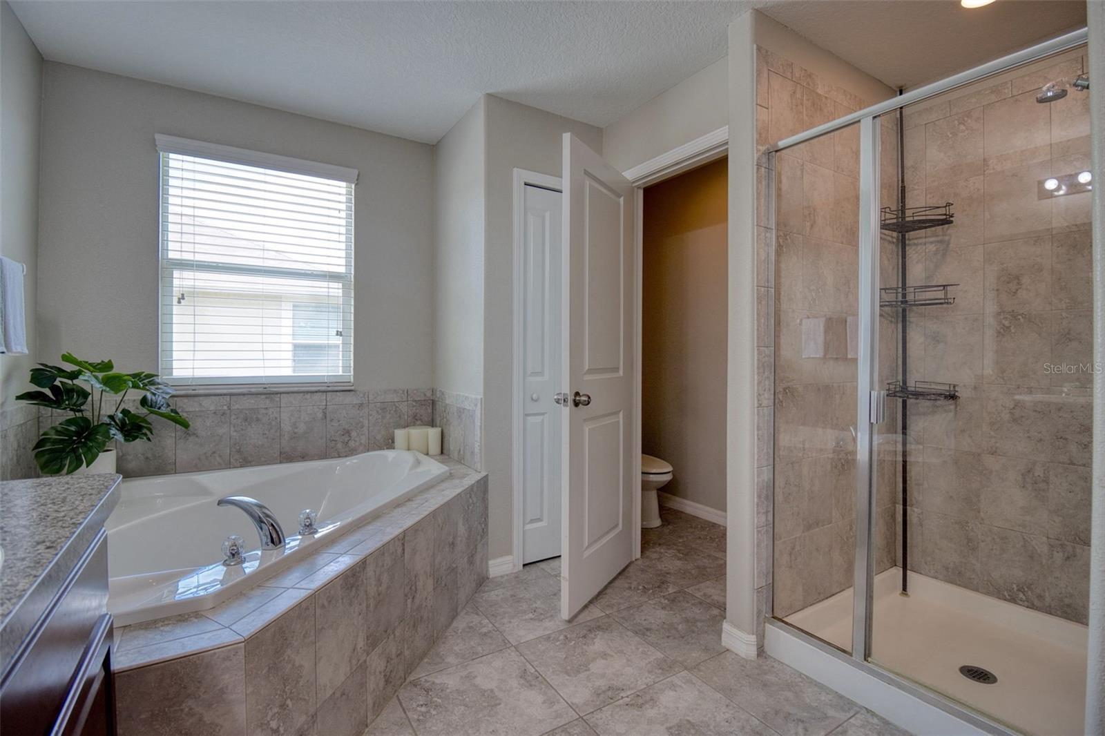 Ample storage space includes a walk-in-closet, built in closet and linen closet. Plus a water closet provides added privacy.