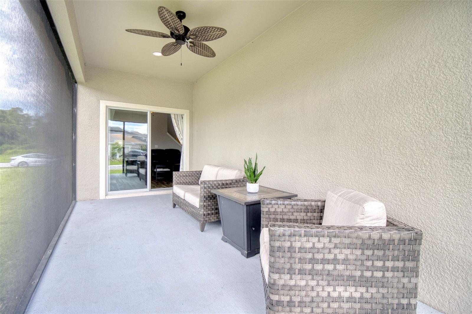 Large panoramic screened-in lanai is a great place to relax.