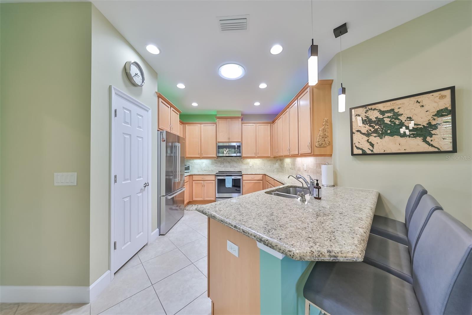 A sparkling clean and spacious kitchen to enjoy any meal preparation.