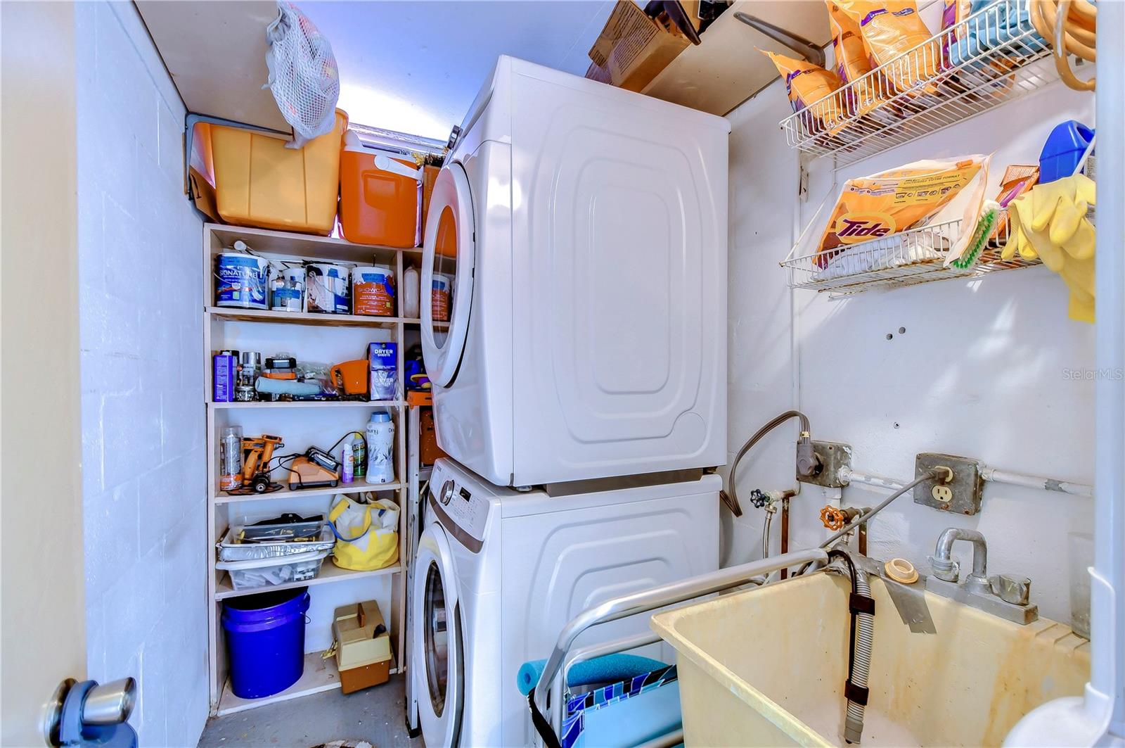 Private Laundry Room with Sink and Extra Storage!