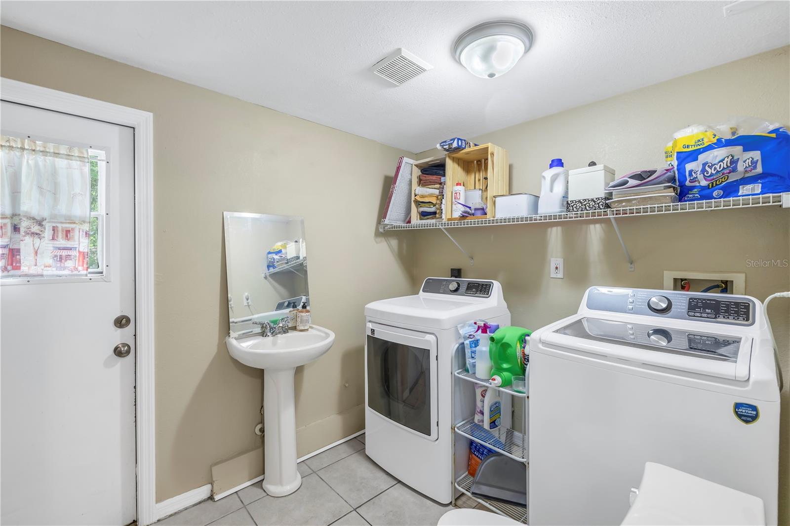 Laundry and 1/2 bath off Family Room with exterior exit to backyard.