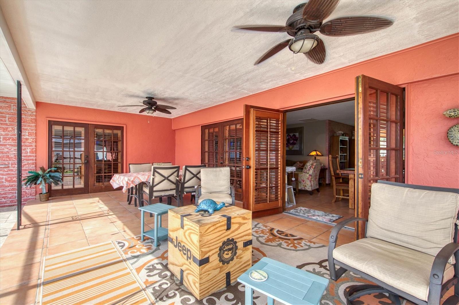 Terra-Cotta floors extend onto patio