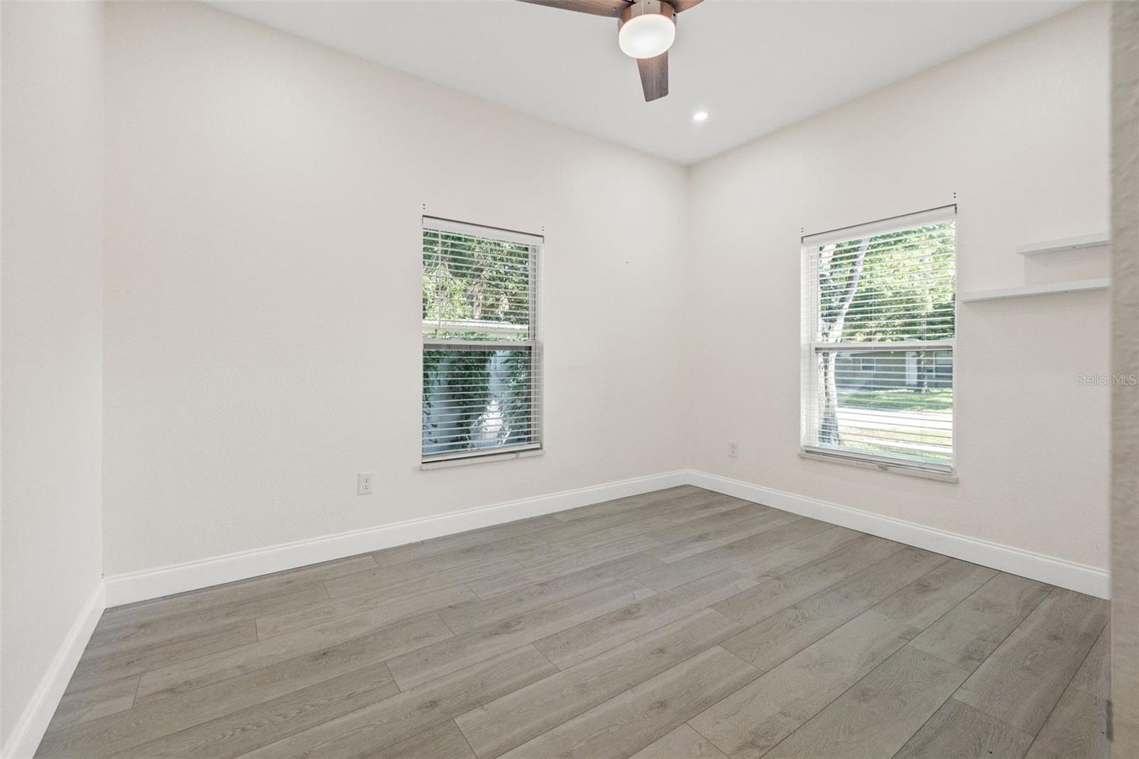 Bedroom 3 - remote ceiling fan / light combo.