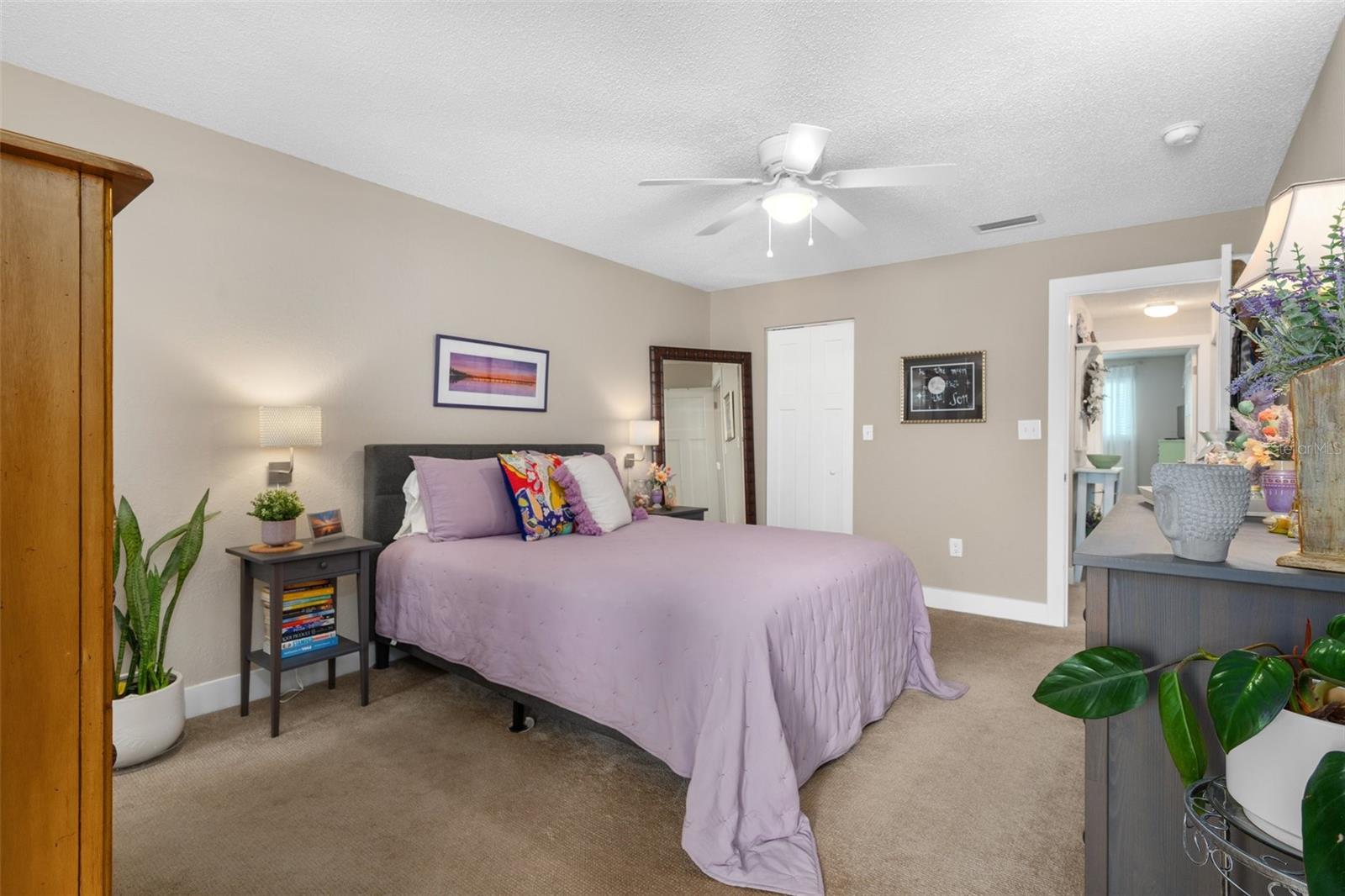 Another view of the primary bedroom.