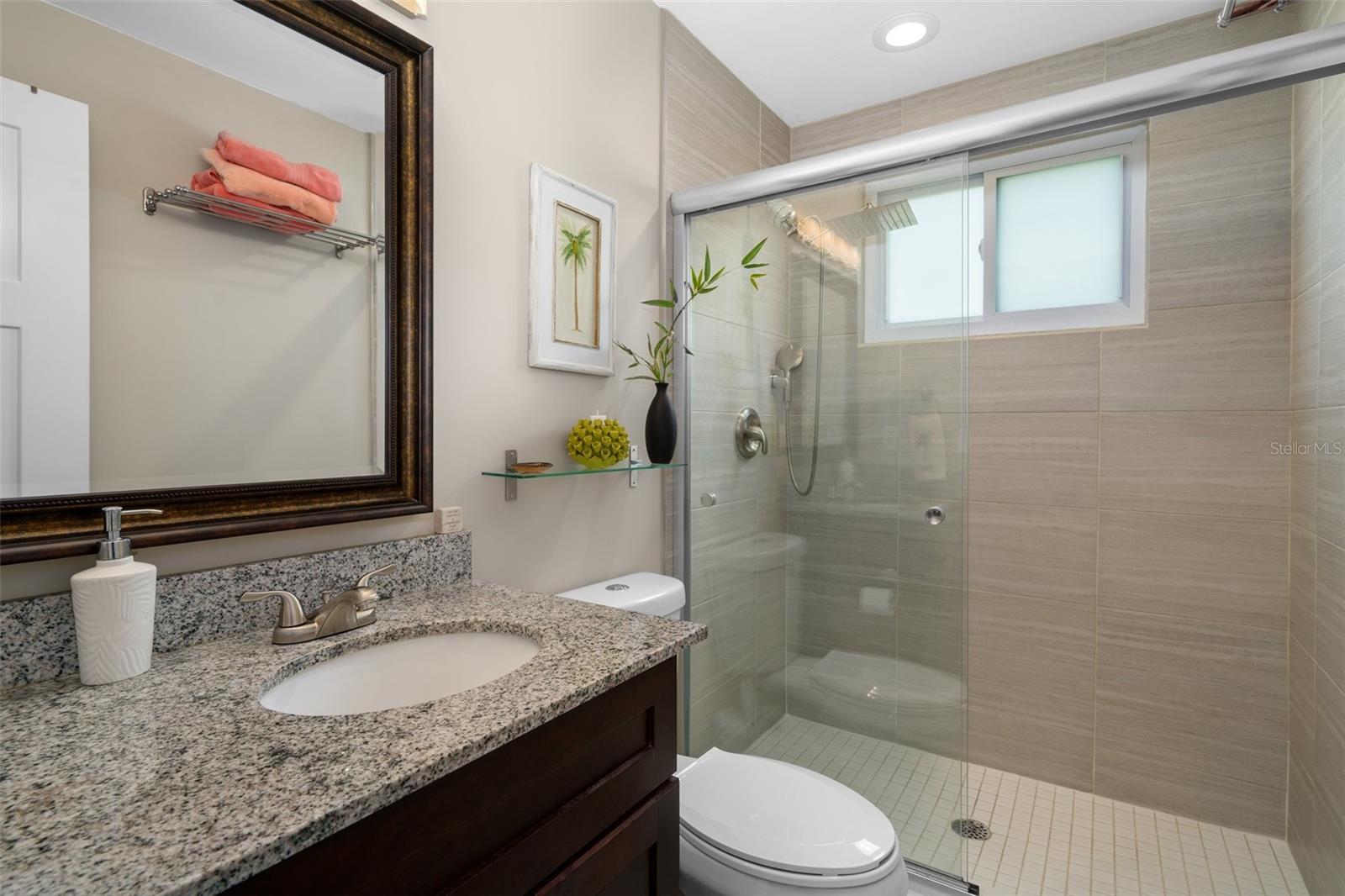 Beautiful en suite bathroom in primary bedroom.