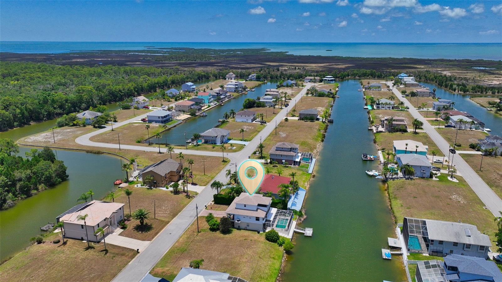 Aerial view of canal and location of residence.