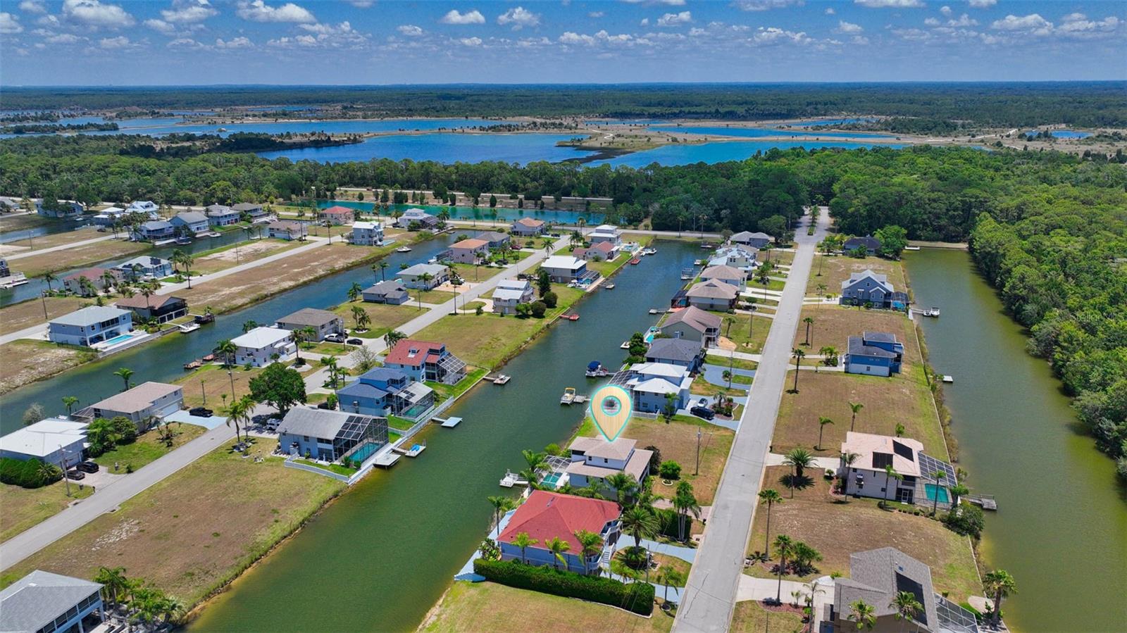 Additional aerial view of canal and location of residence.