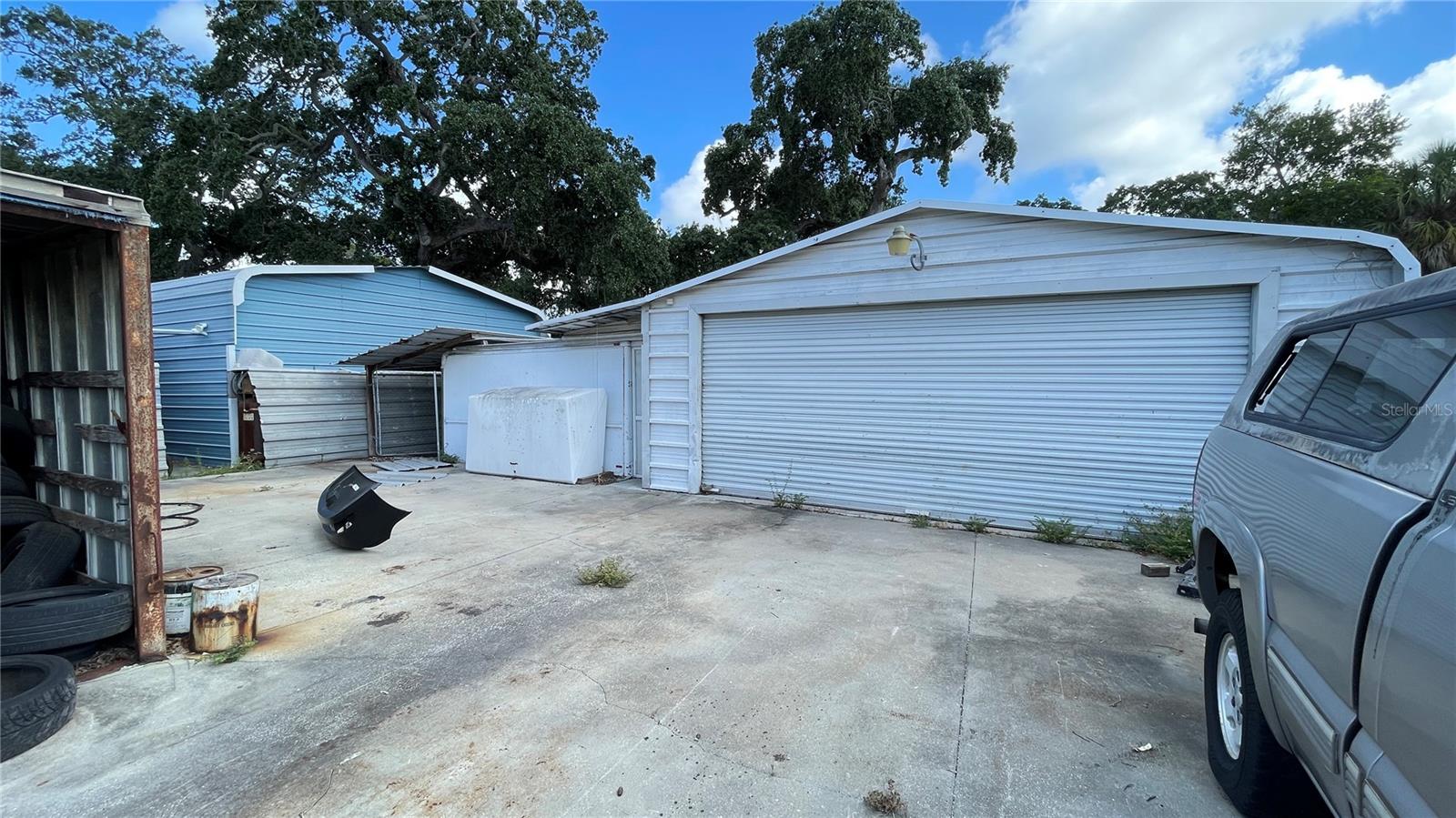 Backside of the property/metal work shop