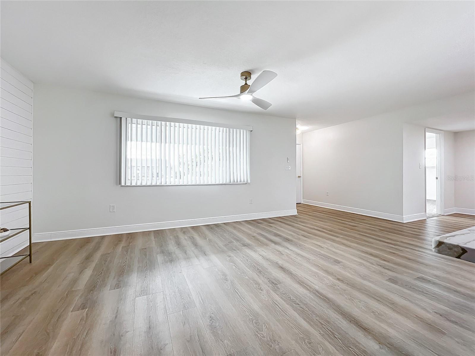 LIVING ROOM WITH CUSTOM SHIPLAP WALL