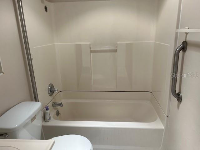 Main bathroom with tub and shower