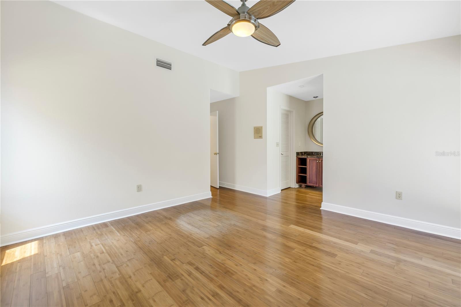 First floor bedroom suite with walk in closet and private bath