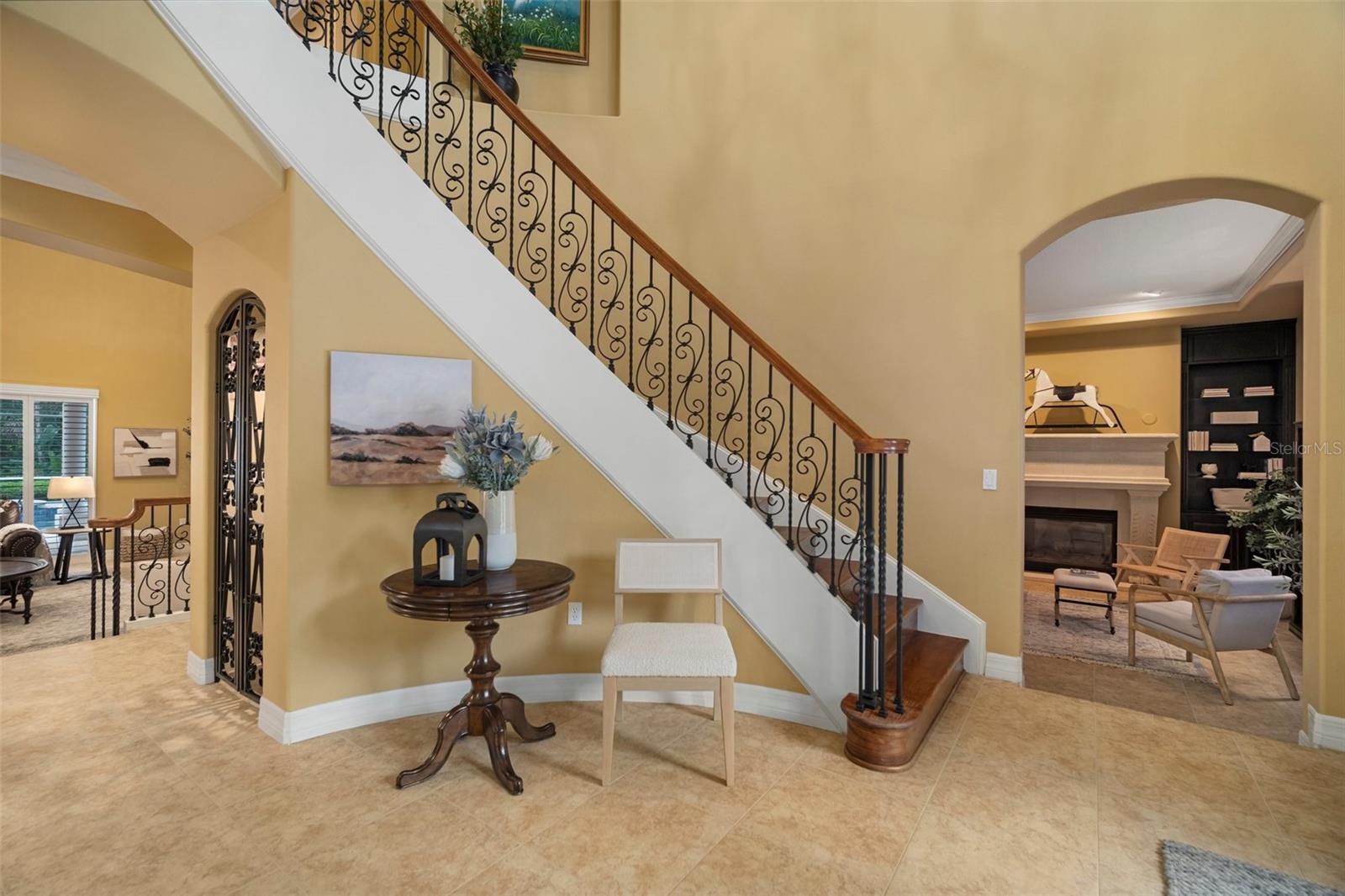 Formal Library with one of three natural gas fireplaces