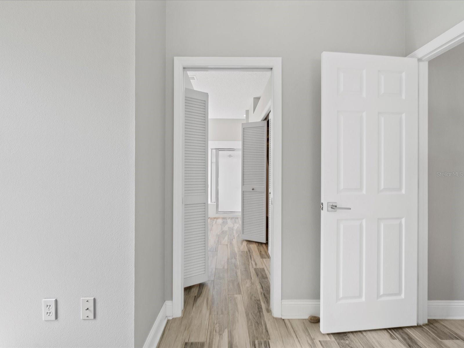 Hall to master bath/closets