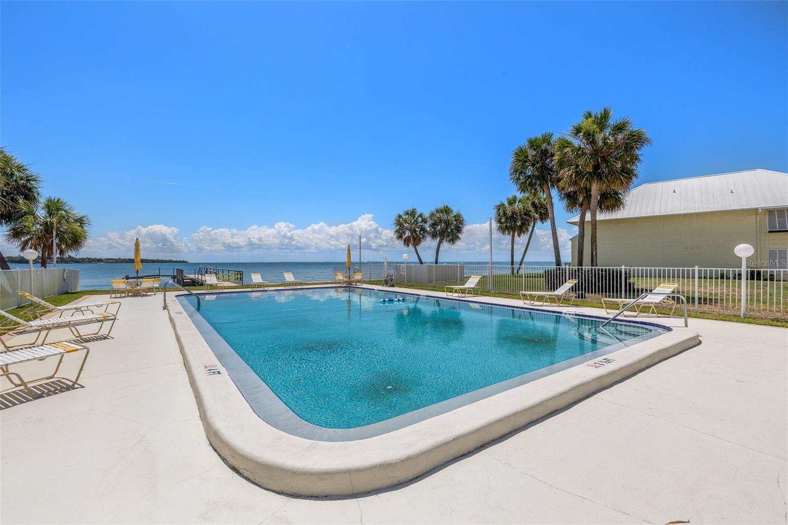 Community pool overlooking the bay