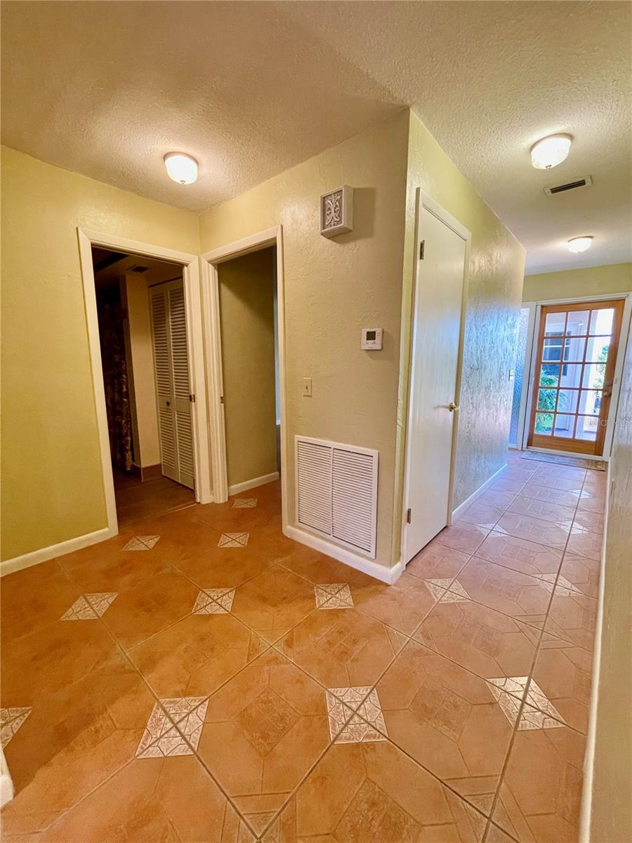 Angle view of hall bath entrance and front 2nd bedroom