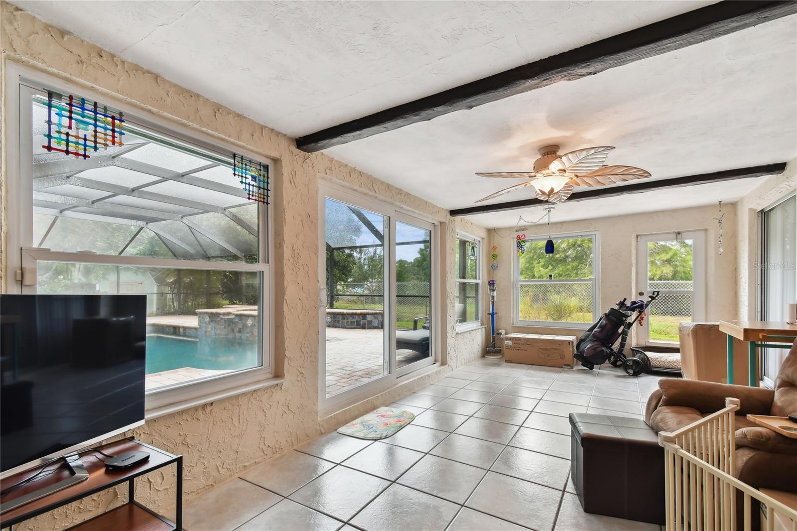 Florida Room looking out to the pool.