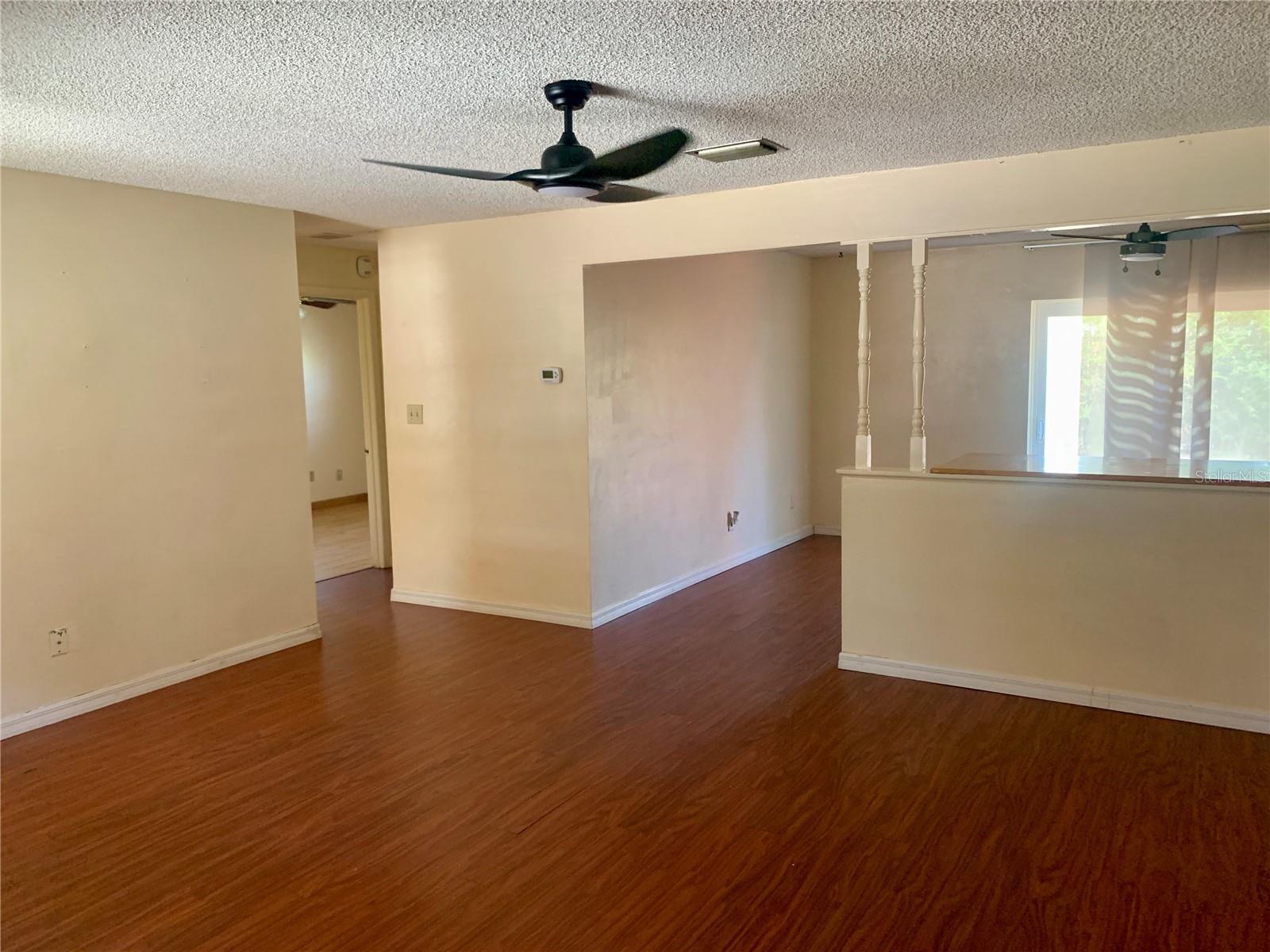 Living room looking toward eat in kitchen area