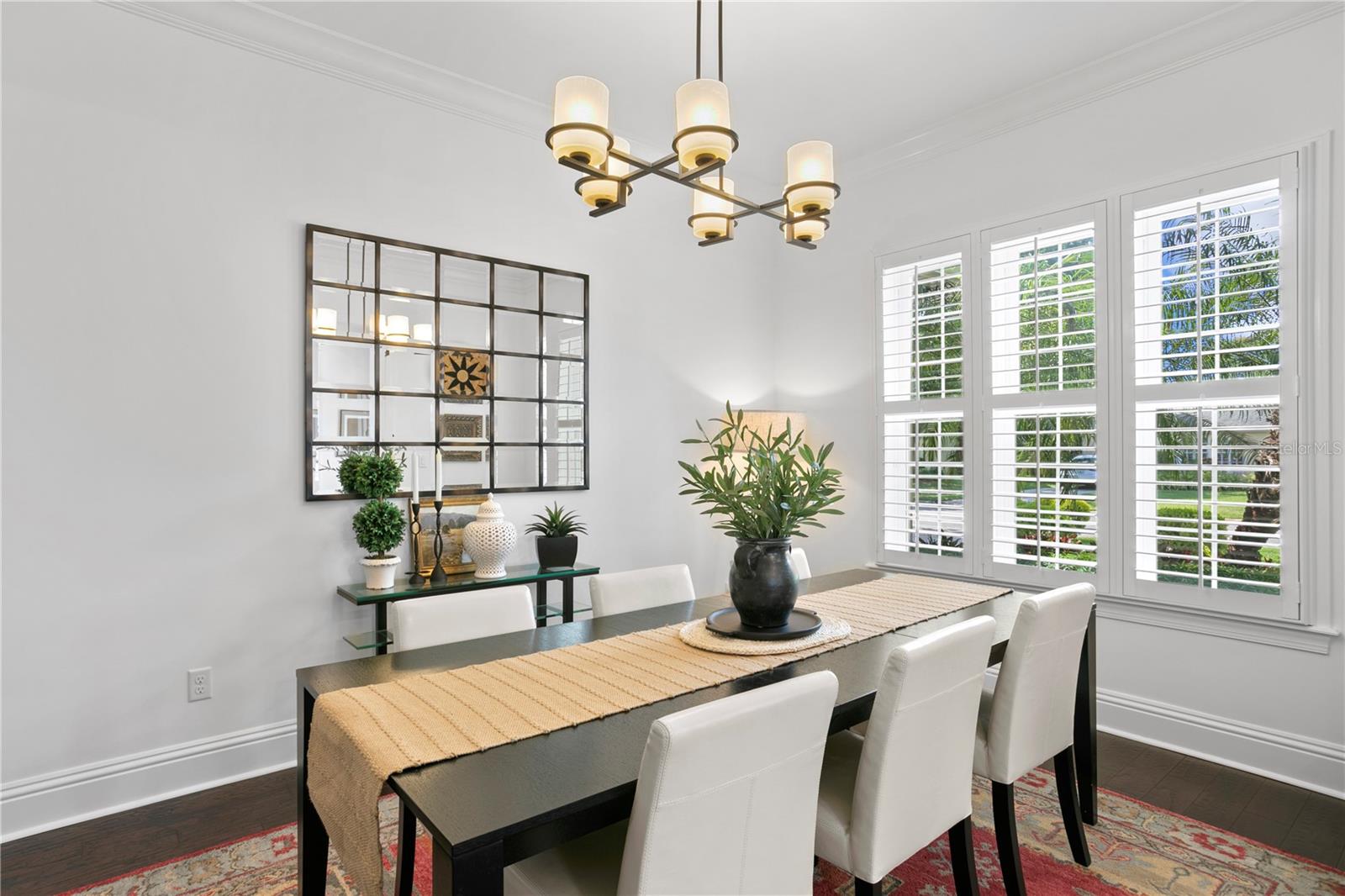 The formal dining room is perfect for Family and Holiday gatherings and features great natural light